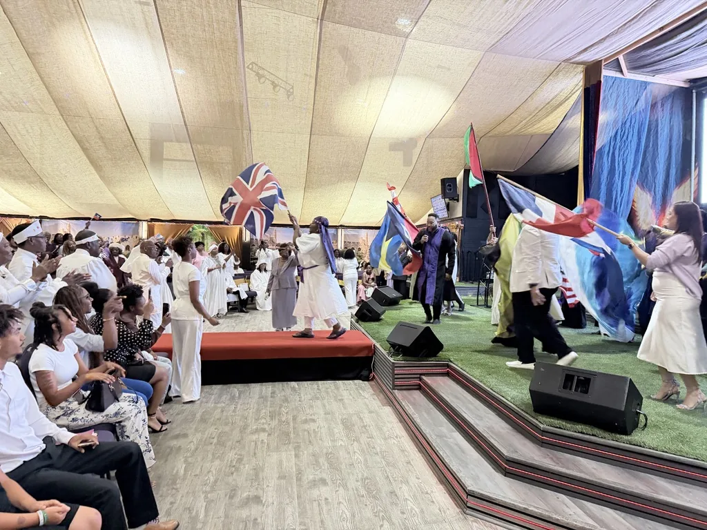 All Nations church family worshiping together