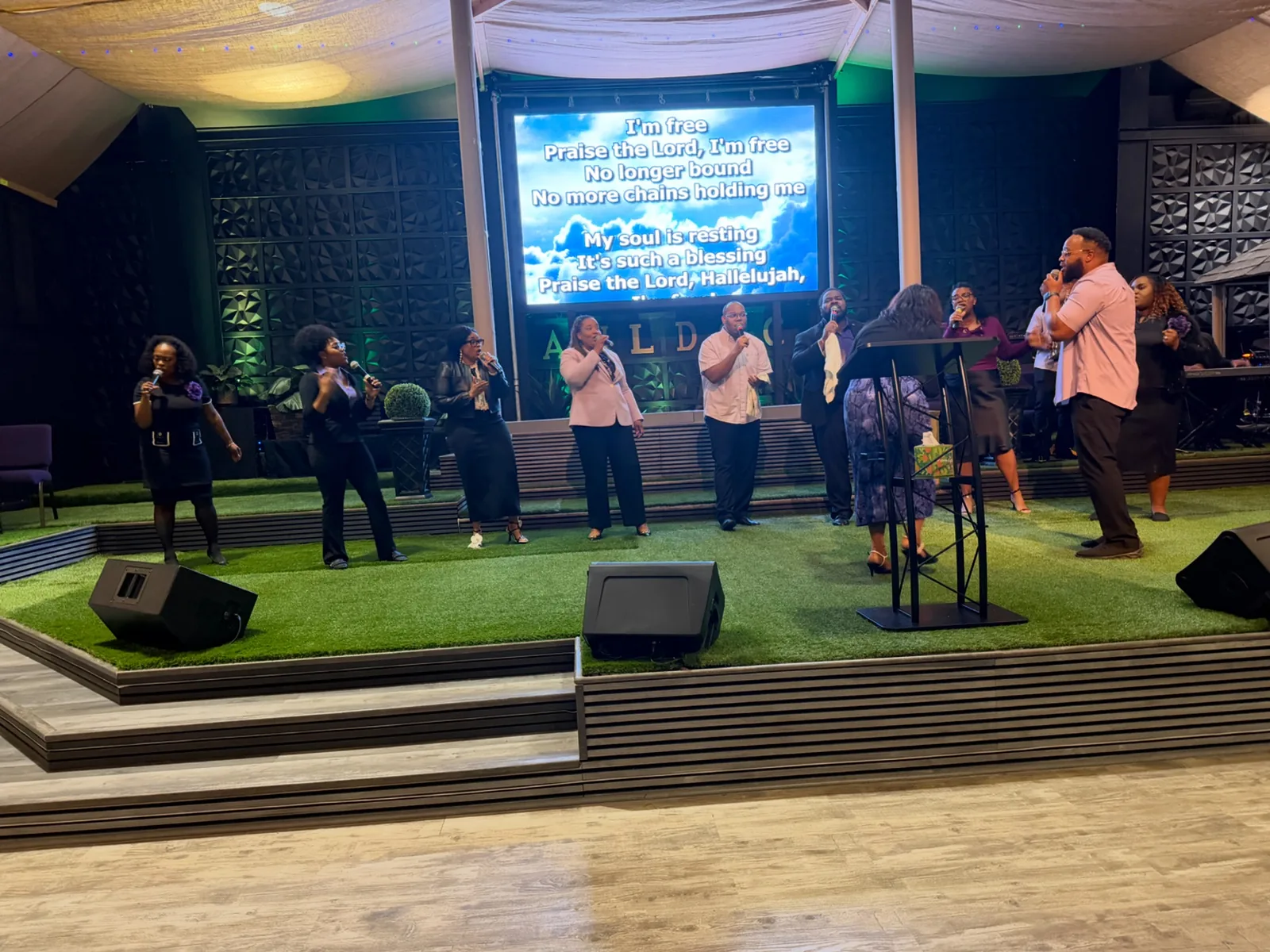 All Nations ministry leaders serving during worship